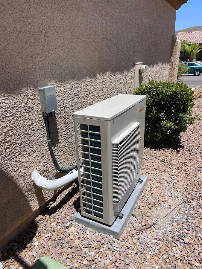 Residential air conditioning condenser unit in Waimea